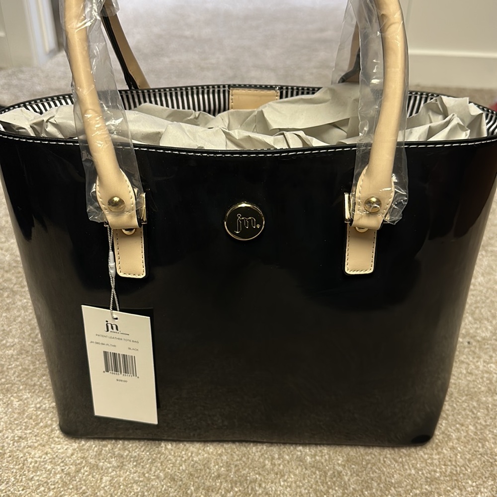 Brand new never worn Jessica Moore Patent Leather bag